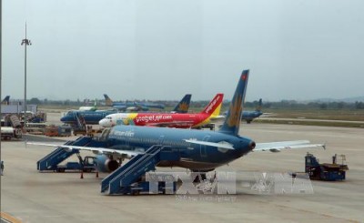 Tàu bay của các hãng hàng không tại Cảng hàng không quốc tế Nội Bài (Hà Nội). Ảnh: Huy Hùng/TTXVN